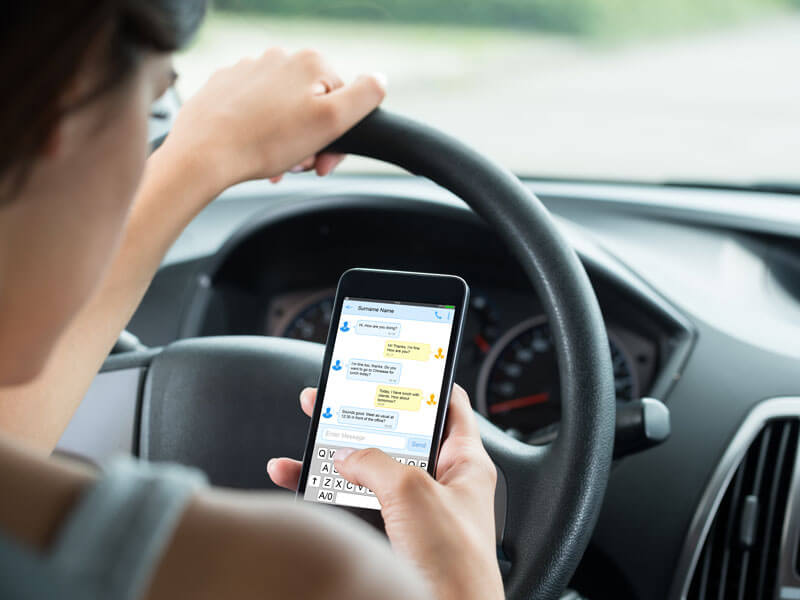 Woman-Texting-While-Driving